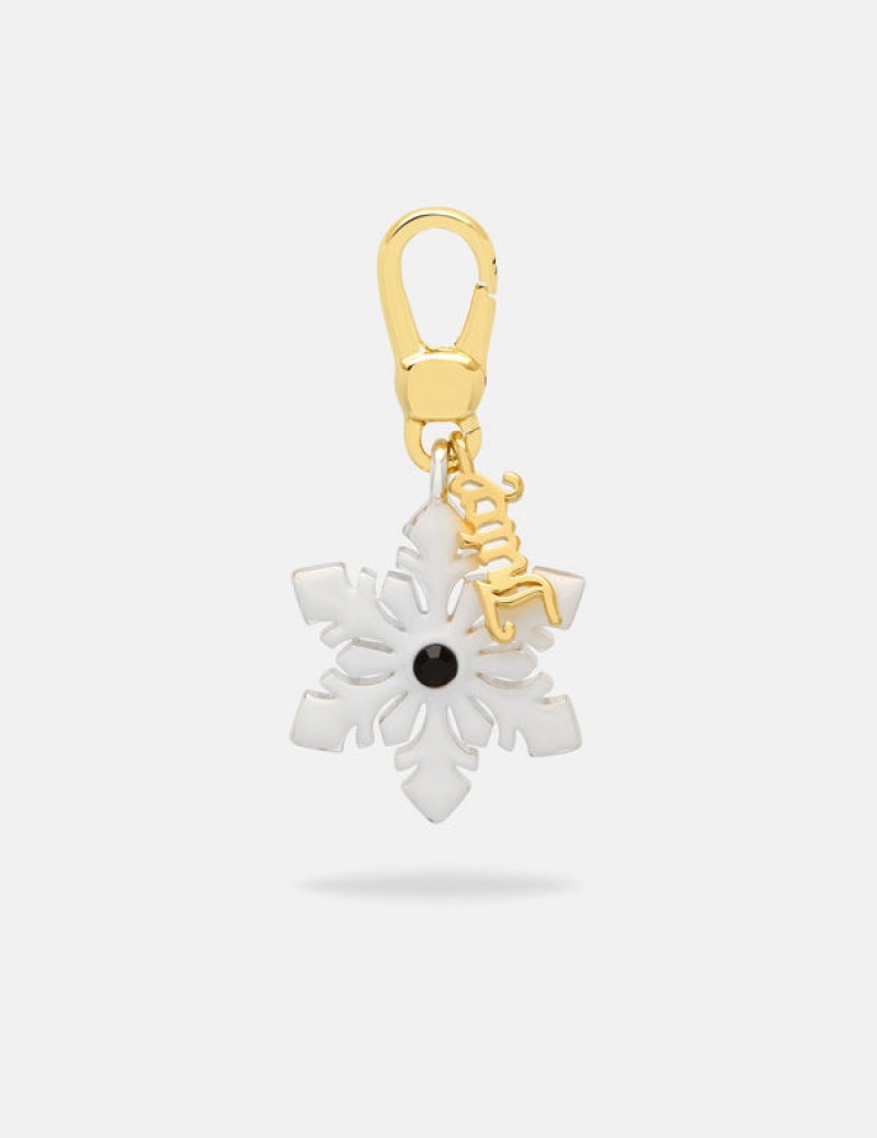 Gold Juicy Couture Enamel Snowflake Charm | JC-SN652400